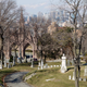 The Manhattan skyline is visible beyond Green-Wood Cemetery in Brooklyn, New York.